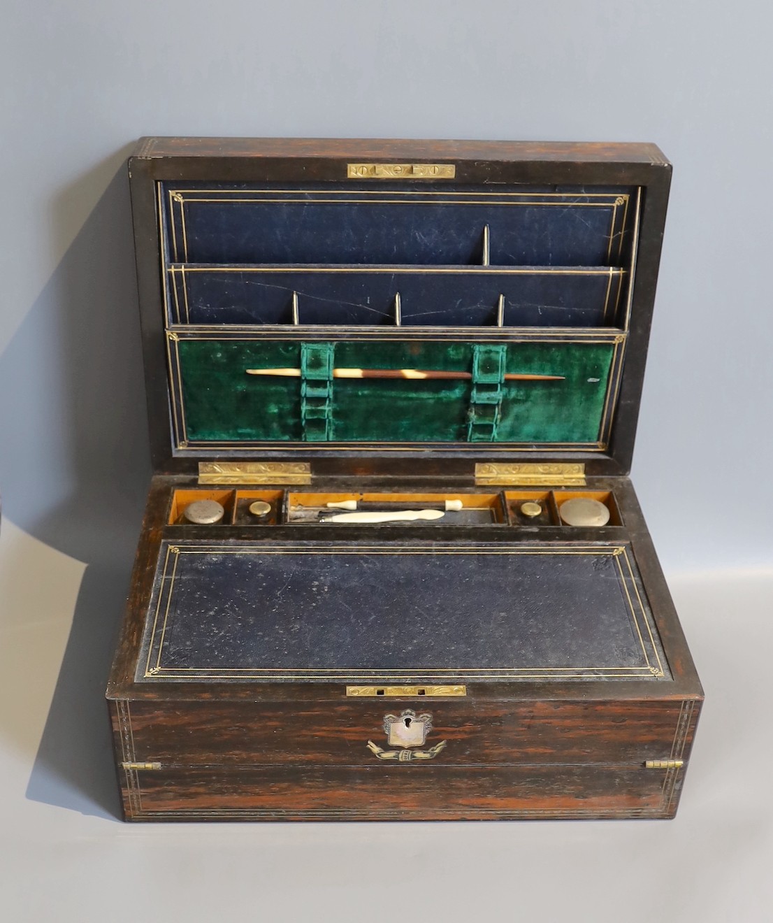 A Victorian mother of pearl inlaid coromandel writing slope